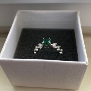 Women’s size 7 silver band with emerald stone